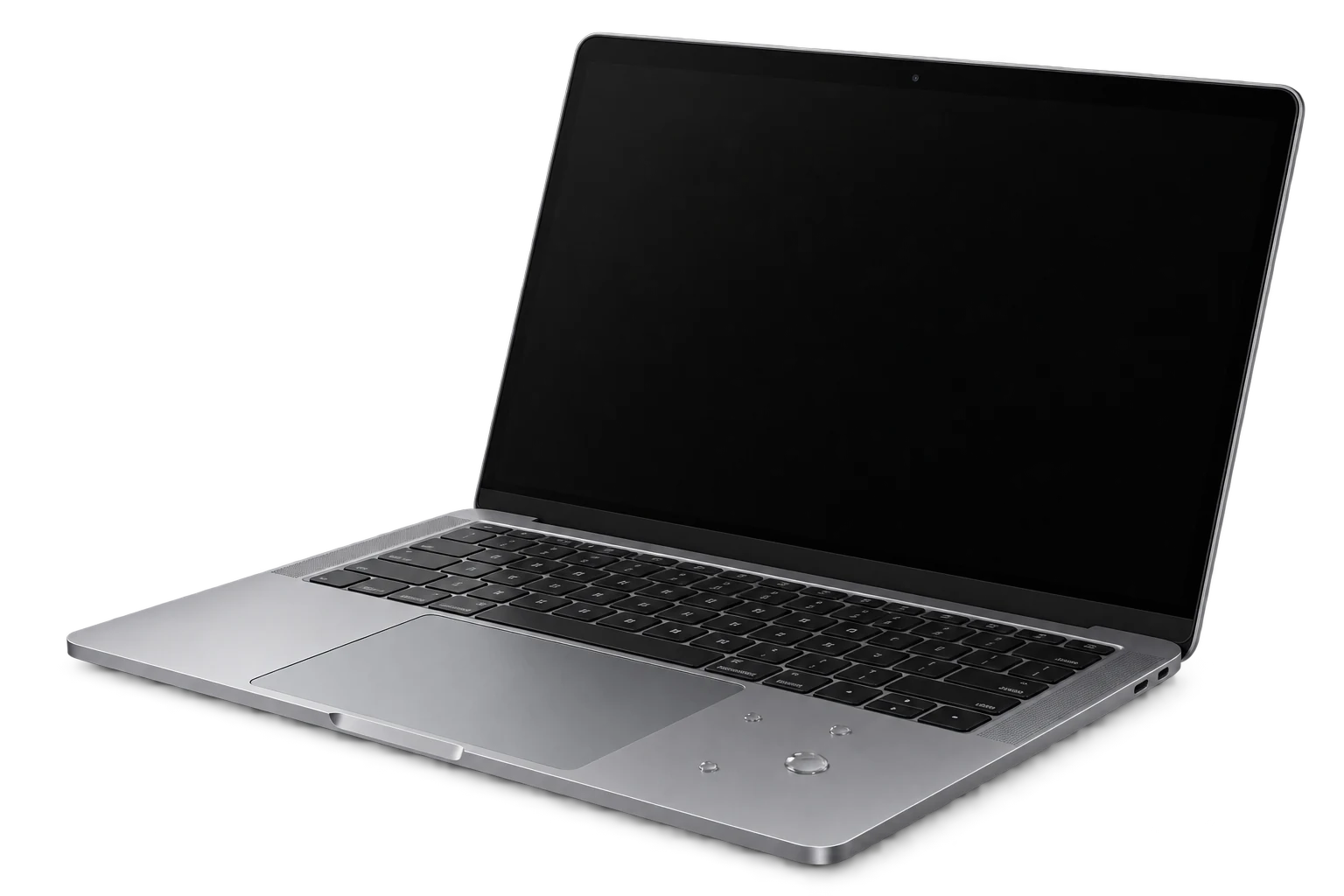 MacBook apagado con pequeñas gotas sobre el reposamanos.